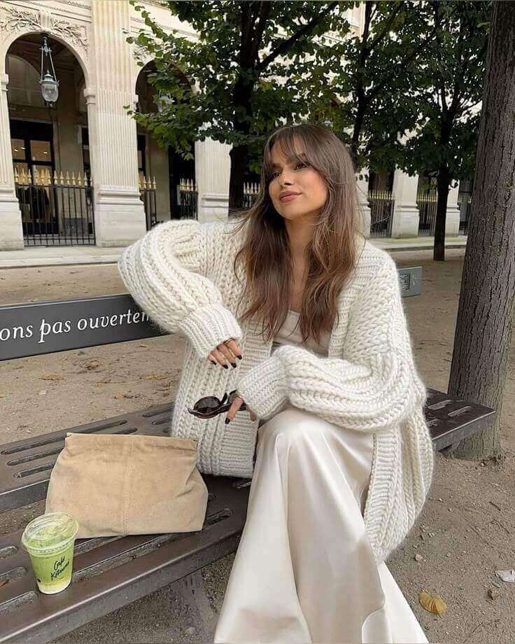 White Satin Skirt 
https://outfitonpoint.com/chic-white-skirt-outfit-ideas-thatll-turn-heads-this-winter/