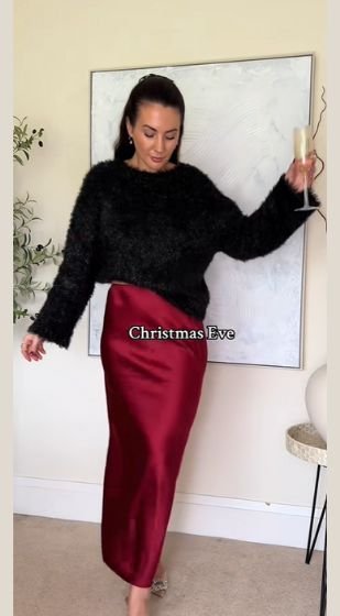 satin red skirt outfit 
https://outfitonpoint.com/stunning-red-skirt-christmas-outfits-thatll-get-you-all-the-compliments/