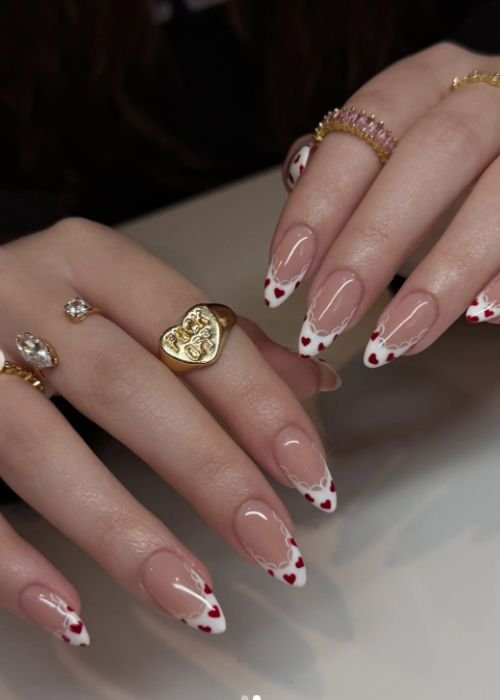cute valentine nails 
https://outfitonpoint.com/romantic-pink-valentine-nails-you-can-diy-at-home/
